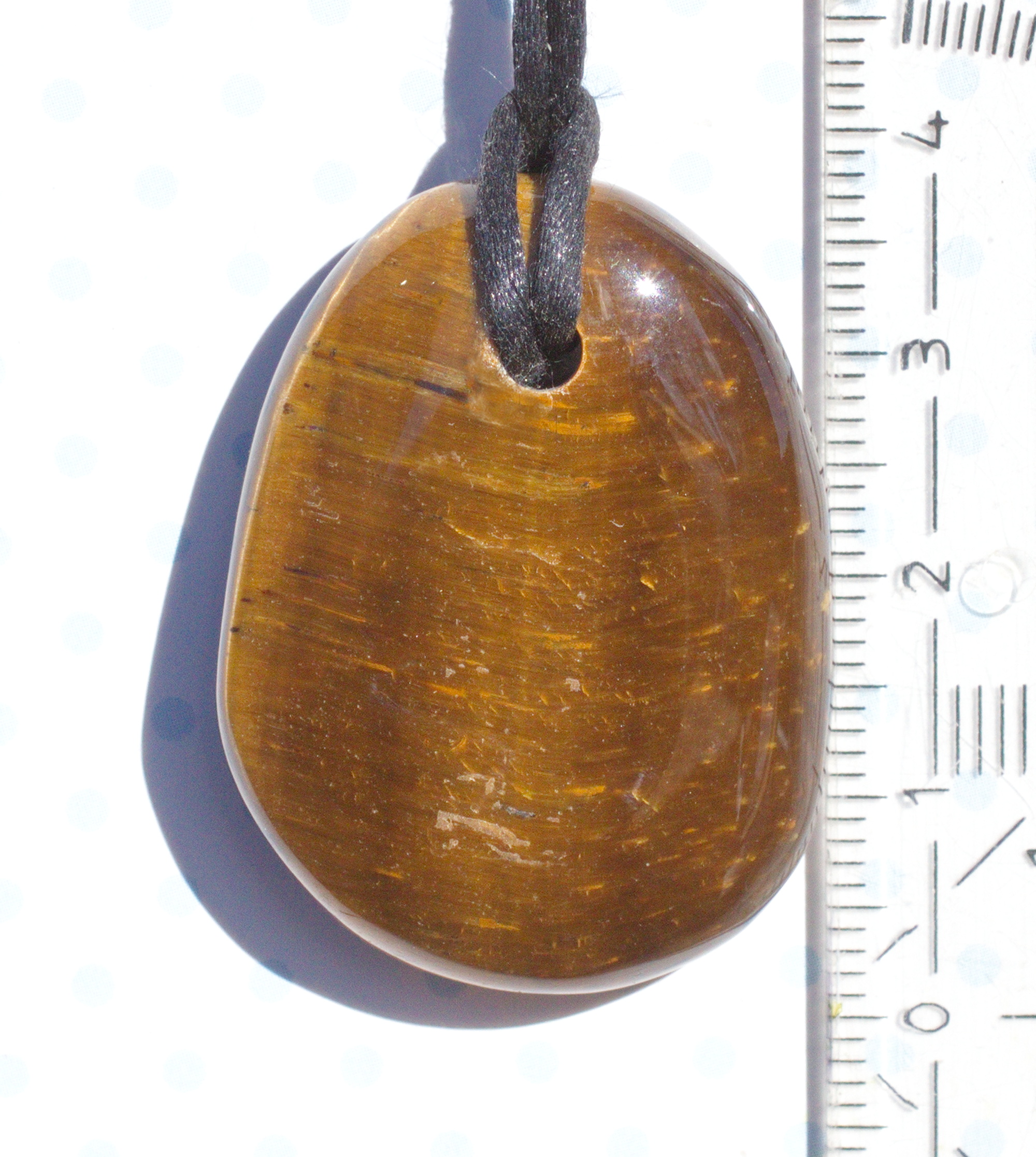 Tigerauge Edelsteinanhänger front gebohrt mit Lederband  